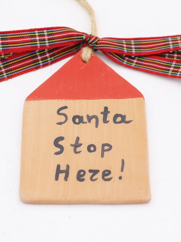 Hanging “Santa Stop Here!"